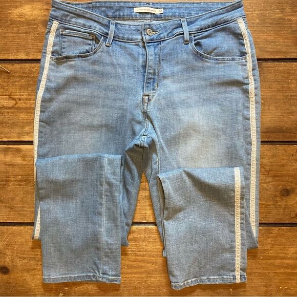Levi’s Classic Mid Rise Skinny Jeans Size 32 Metallic Sides Light Wash - Picture 2 of 8